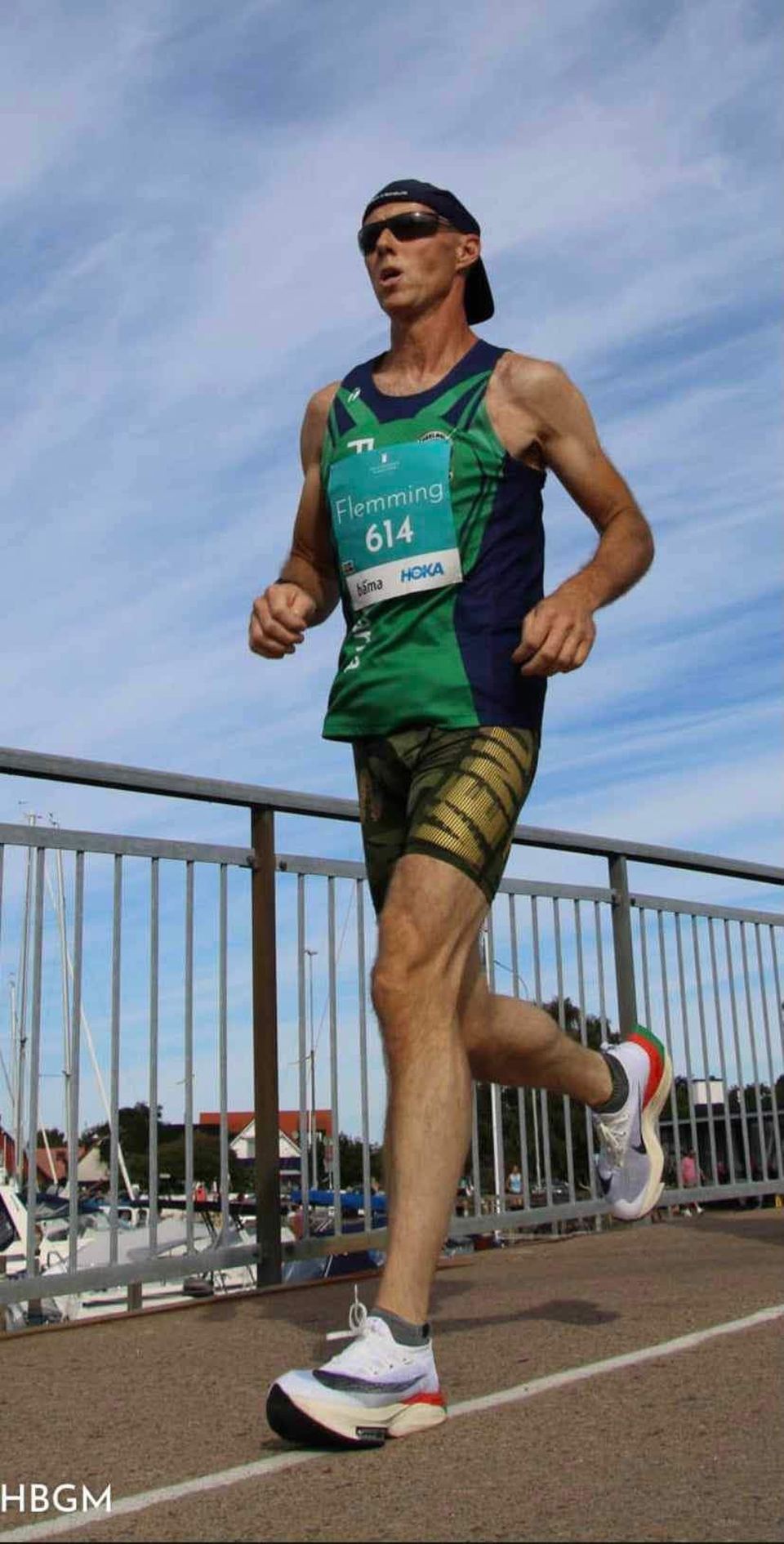 Flemming running in a race, wearing bib number 614